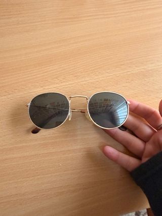 Gafas de sol vintage doradas y negras