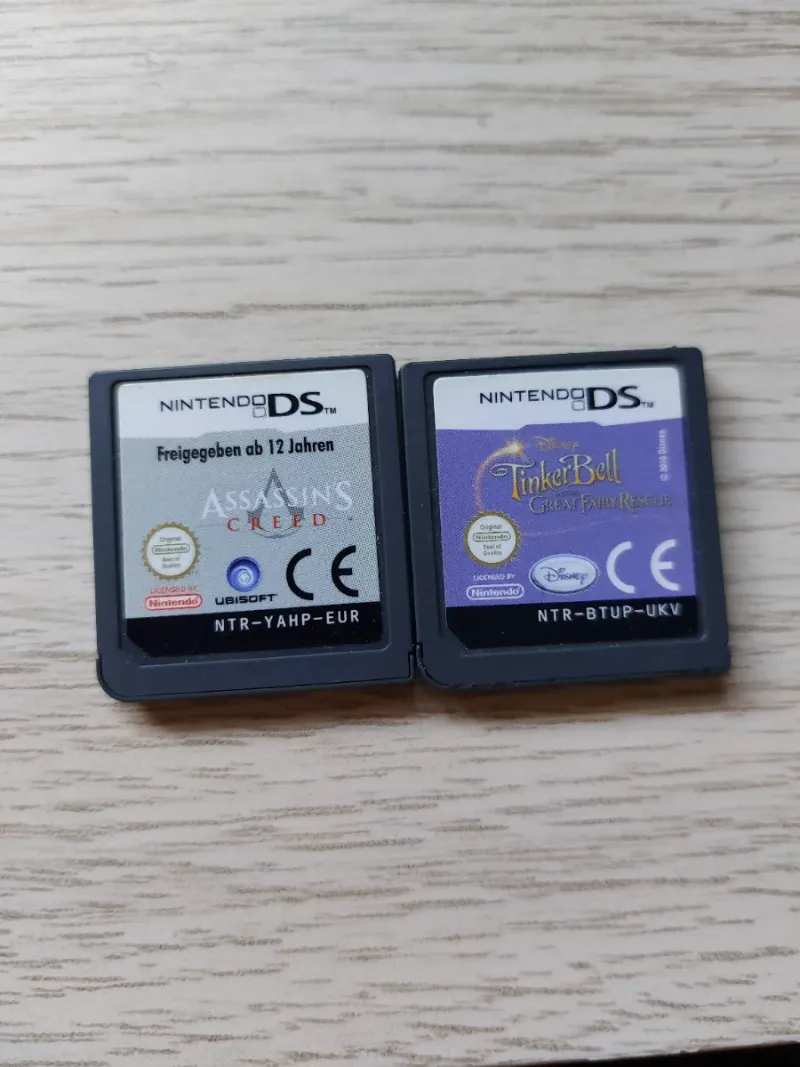 2 Juegos Nintendo DS Assassin's Creed y Campanilla