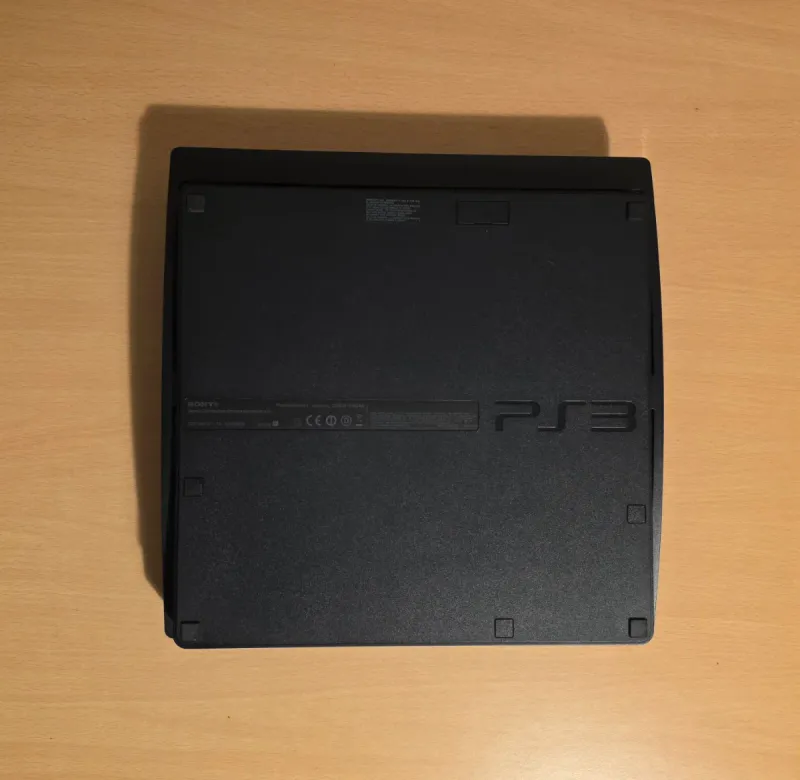 Playstation 3 Slim 160gb + Mando + Juego afbeelding 4
