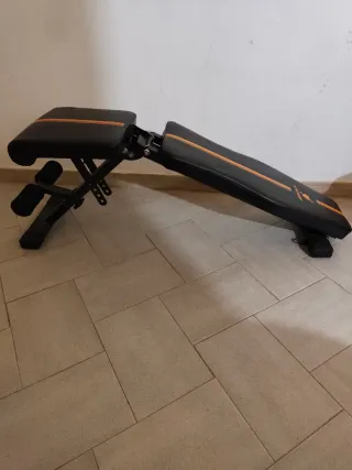 Banco de musculación ajustable y plegable