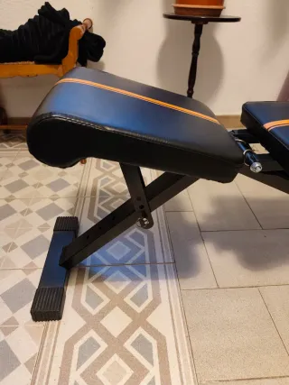 Banco de musculación ajustable y plegable