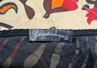 Top negro velo y estampado cebra