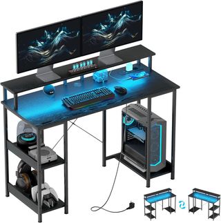 Escritorio para Computadora Reversible con Estantes, 120X50 Cm Escritorio de Oficina con Tomas de Corriente y Luces LED, Mesa para PC de Estudio con Doble Soporte para Monitor, Negro