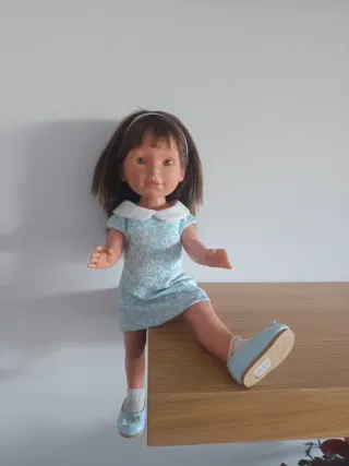 Muñeca vestida de azul