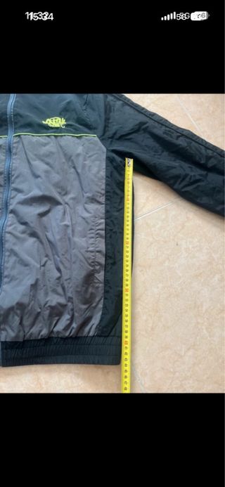 Cortavientos Syna World Negro y Gris