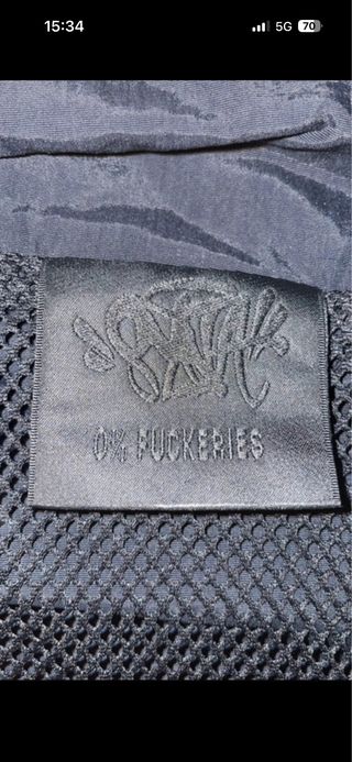 Cortavientos Syna World Negro y Gris