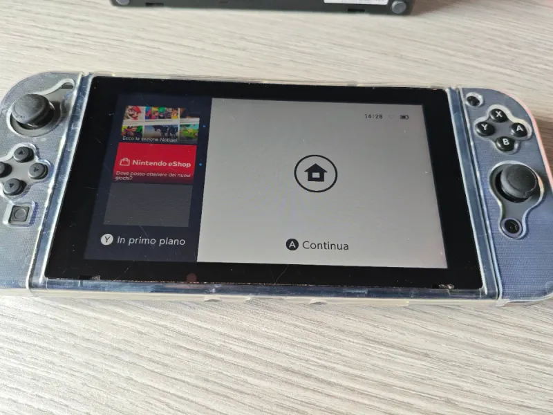 Nintendo Switch + FIFA 18 y accesorios afbeelding 3