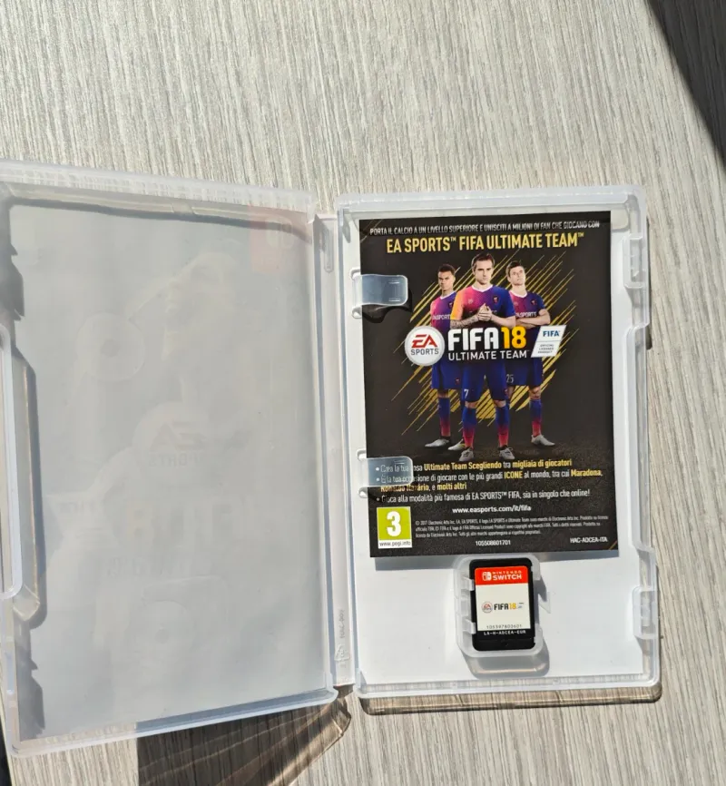 Nintendo Switch + FIFA 18 y accesorios afbeelding 9