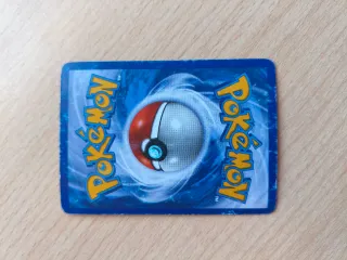 Carta Pokémon Charizard Niv. 76