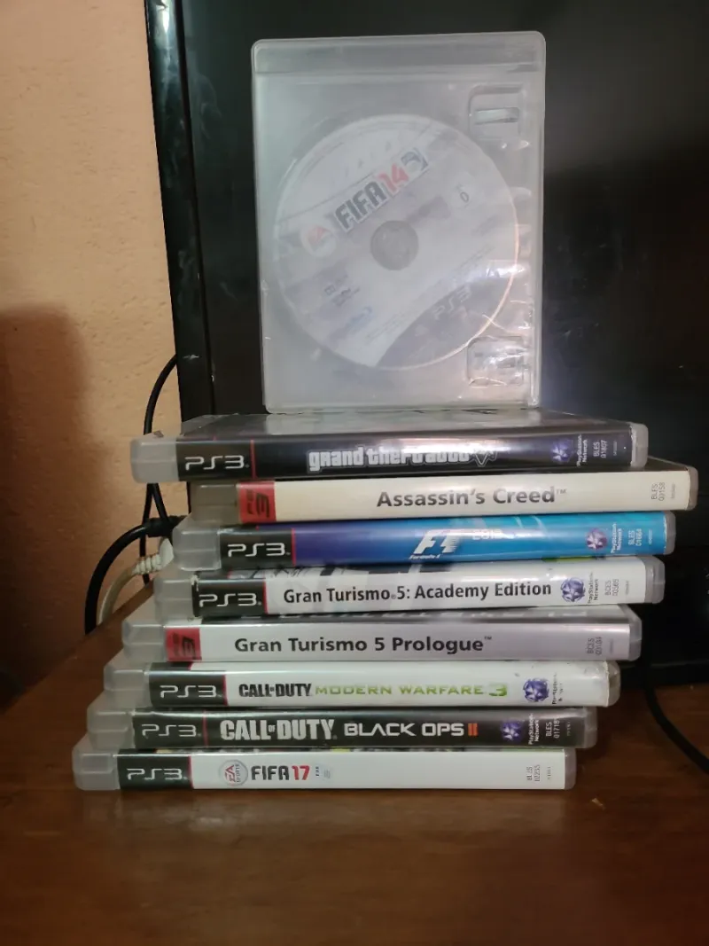 Consola PS3 con mando y 9 juegos afbeelding 2