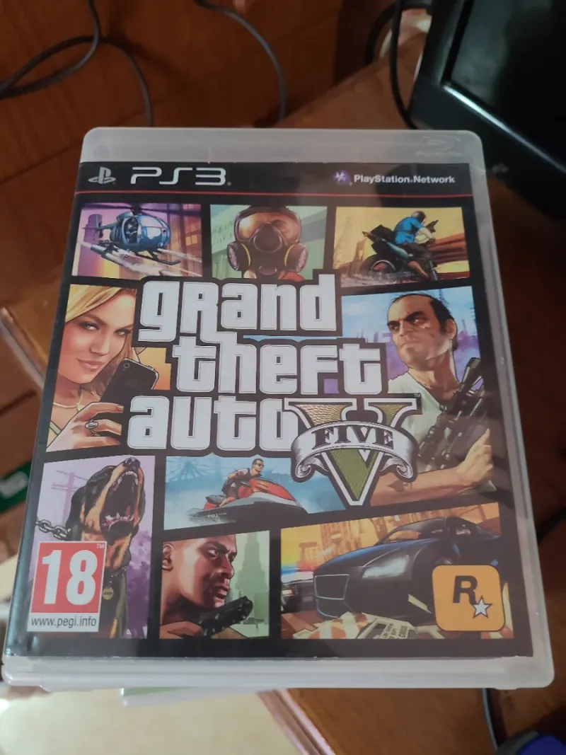 Consola PS3 con mando y 9 juegos afbeelding 3