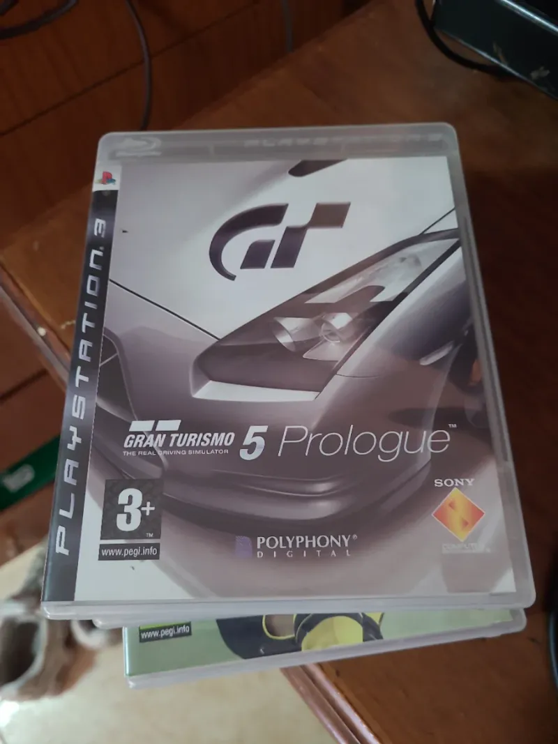 Consola PS3 con mando y 9 juegos afbeelding 7