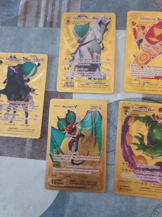Cartas Pokémon Doradas V y VMAX