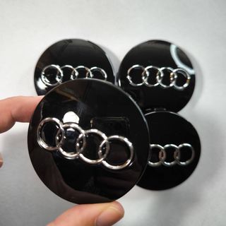TAPABUJES AUDI 60mm NEGRO - EMBLEMA LLANTAS AUDI