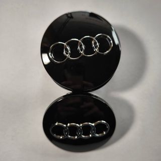 TAPABUJES AUDI 60mm NEGRO - EMBLEMA LLANTAS AUDI