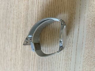 Reloj Swatch Dorado y Plateado