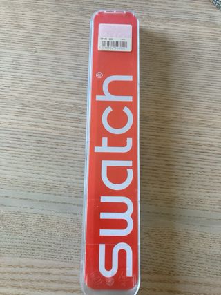 Reloj Swatch Dorado y Plateado