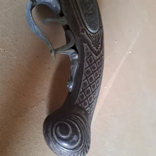 Pistola antigua de juguete