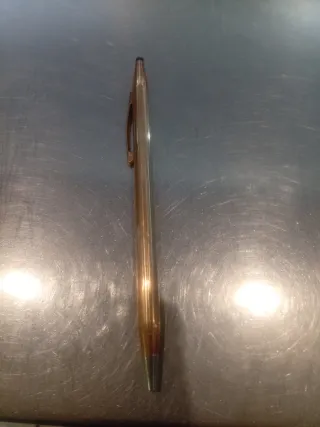 Bolígrafo Cross Dorado con golpe