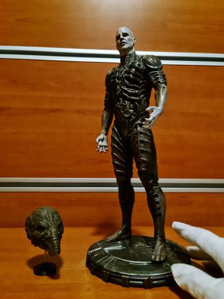 prometheus engineer statue with helmet