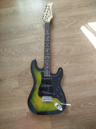 Guitarra Eléctrica + Cuerdas + Capo