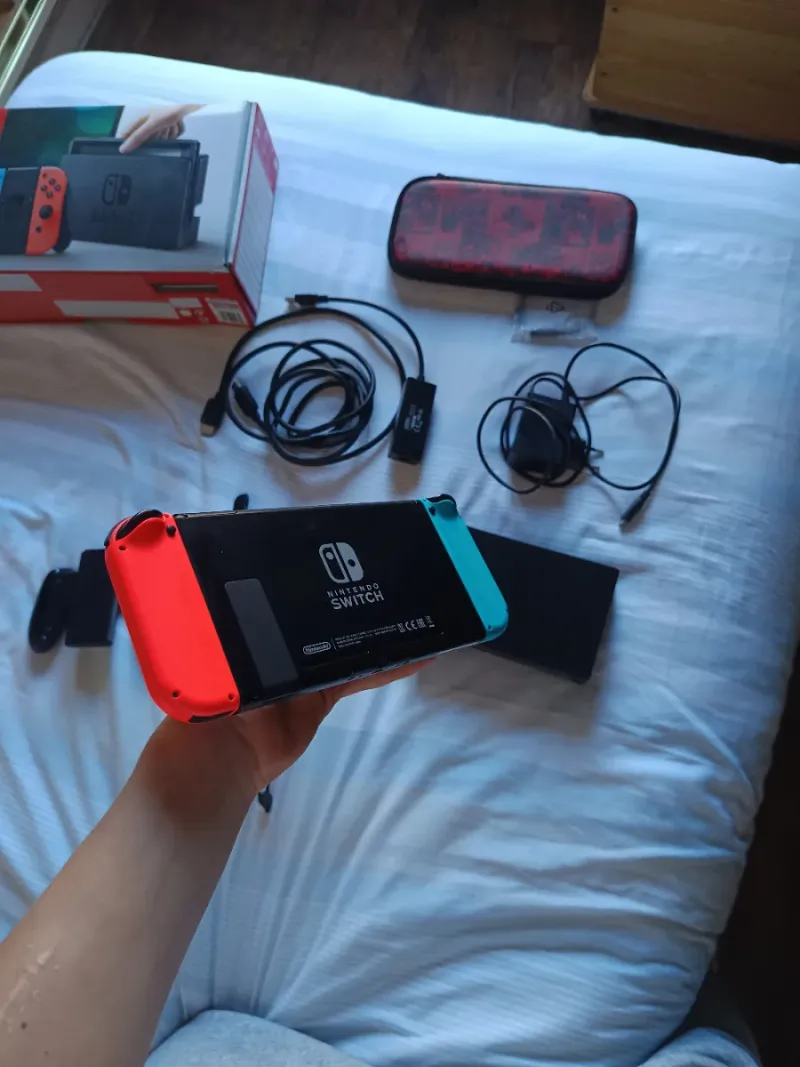 Nintendo Switch Azul/Rojo + Accesorios afbeelding 3