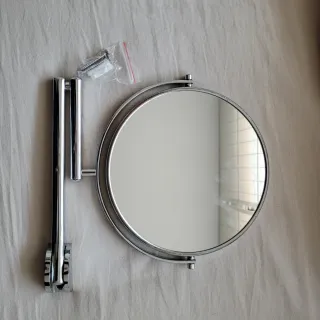 Espejo de aumento extensible