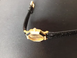 Orologio vintage anni 90 oro e nero