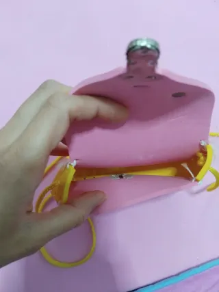 Bolso infantil rosa con flores amarillas