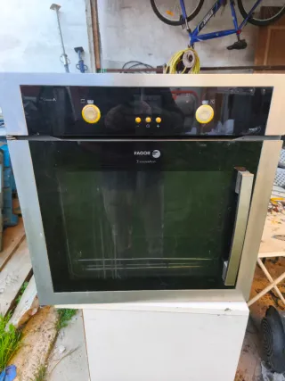 Placa vitrocerámica Fagor. de inducción. Y horno