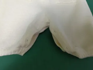 Pagliaccetto neonato con coniglietti
