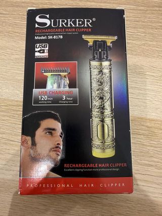 Maquina de corte de pelo y barba dorada