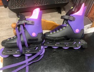 Patines en línea morados y negros Inline skate.