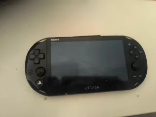 PS Vita Negra + 2 Juegos Físicos