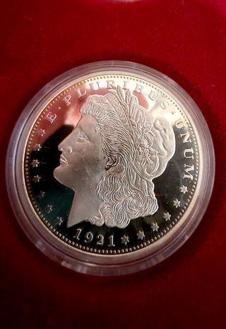 6.5 Oz Puras.  Historia del Dollar Plata Americano