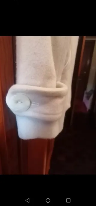 Casaco branco com botão