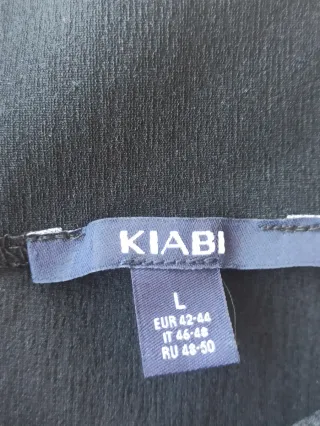 Falda negra mujer con nudo lateral