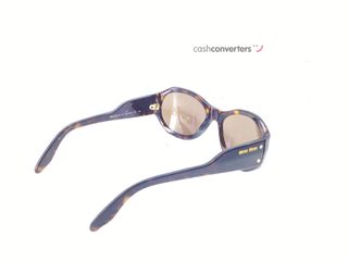 gafa de sol señora miu miu smu10i