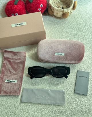 Gafas de Sol Miu Miu SMU11W Negras