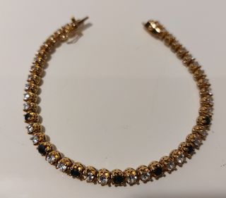 Pulsera b. Oro 18k y plata de ley 925 y 42 zafiros