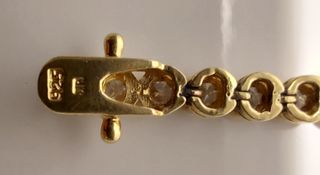 Pulsera b. Oro 18k, plata de ley 925 y 42 zafiros