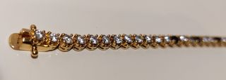 Pulsera b. Oro 18k, plata de ley 925 y 42 zafiros