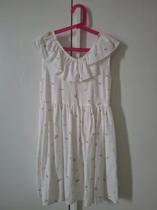 Nuovo vestito bimba bianco con fiori gialli 10 ann