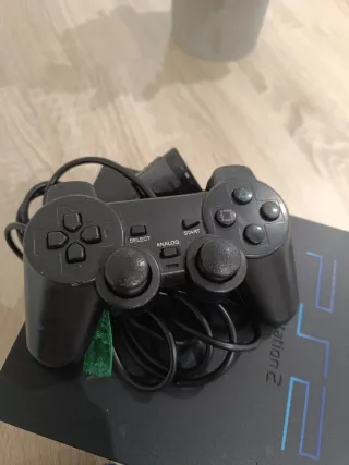 Consola PlayStation 2 + 3 Videojuegos