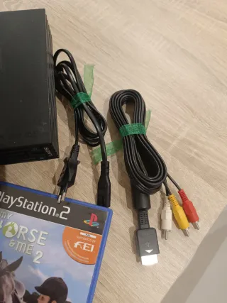 Consola PlayStation 2 + 3 Videojuegos