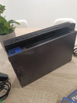 Consola PlayStation 2 + 3 Videojuegos