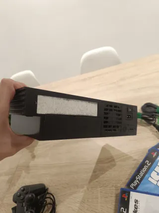 Consola PlayStation 2 + 3 Videojuegos
