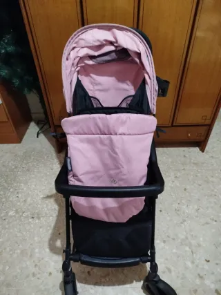 Silla de paseo rosa y negra
