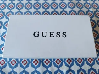 Monedero Guess estampado serpiente