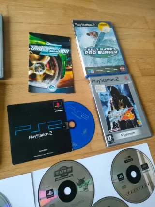 Lote Videojuegos PS2 PS1 accesorios etc